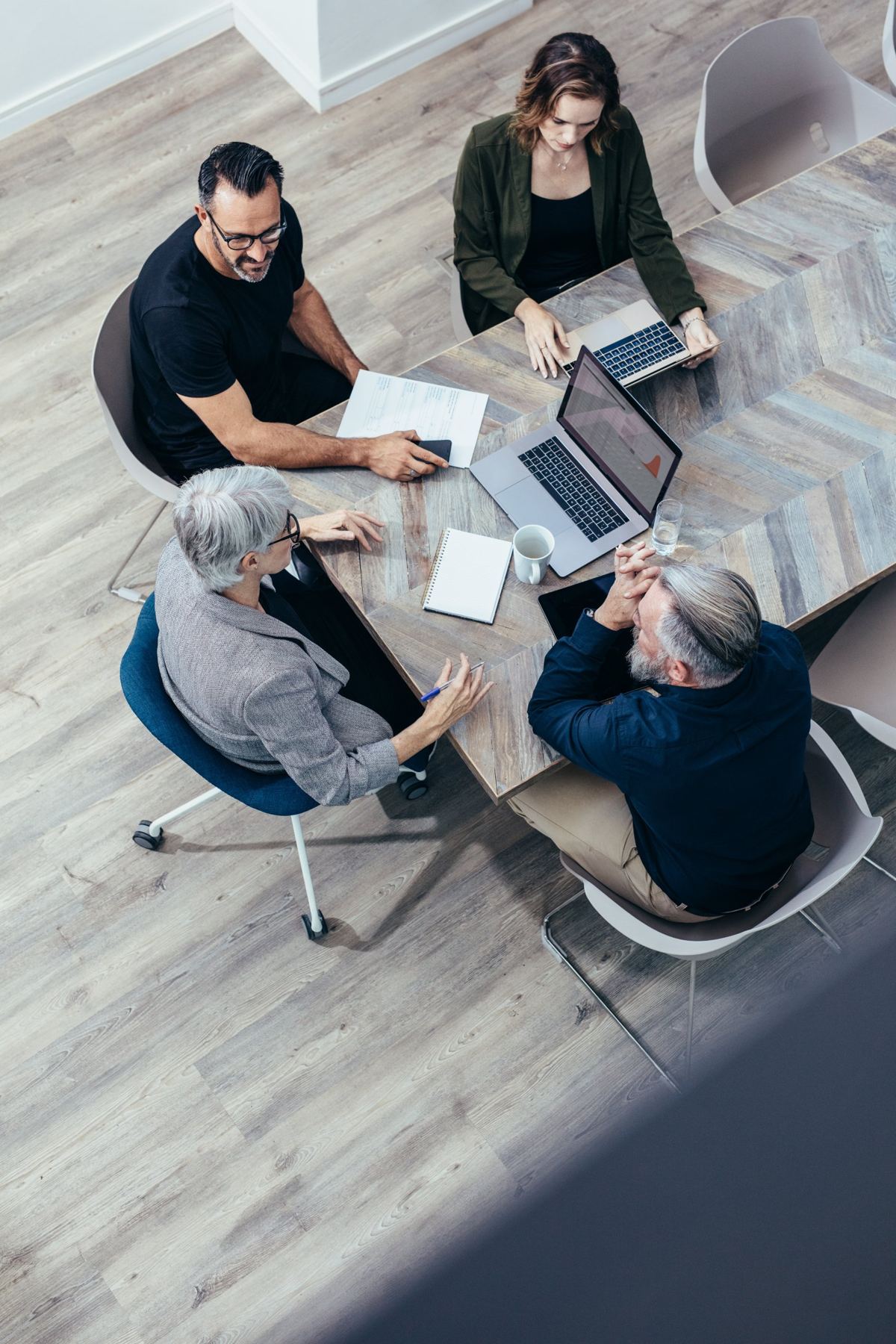 Local business owners collaborating around a table
